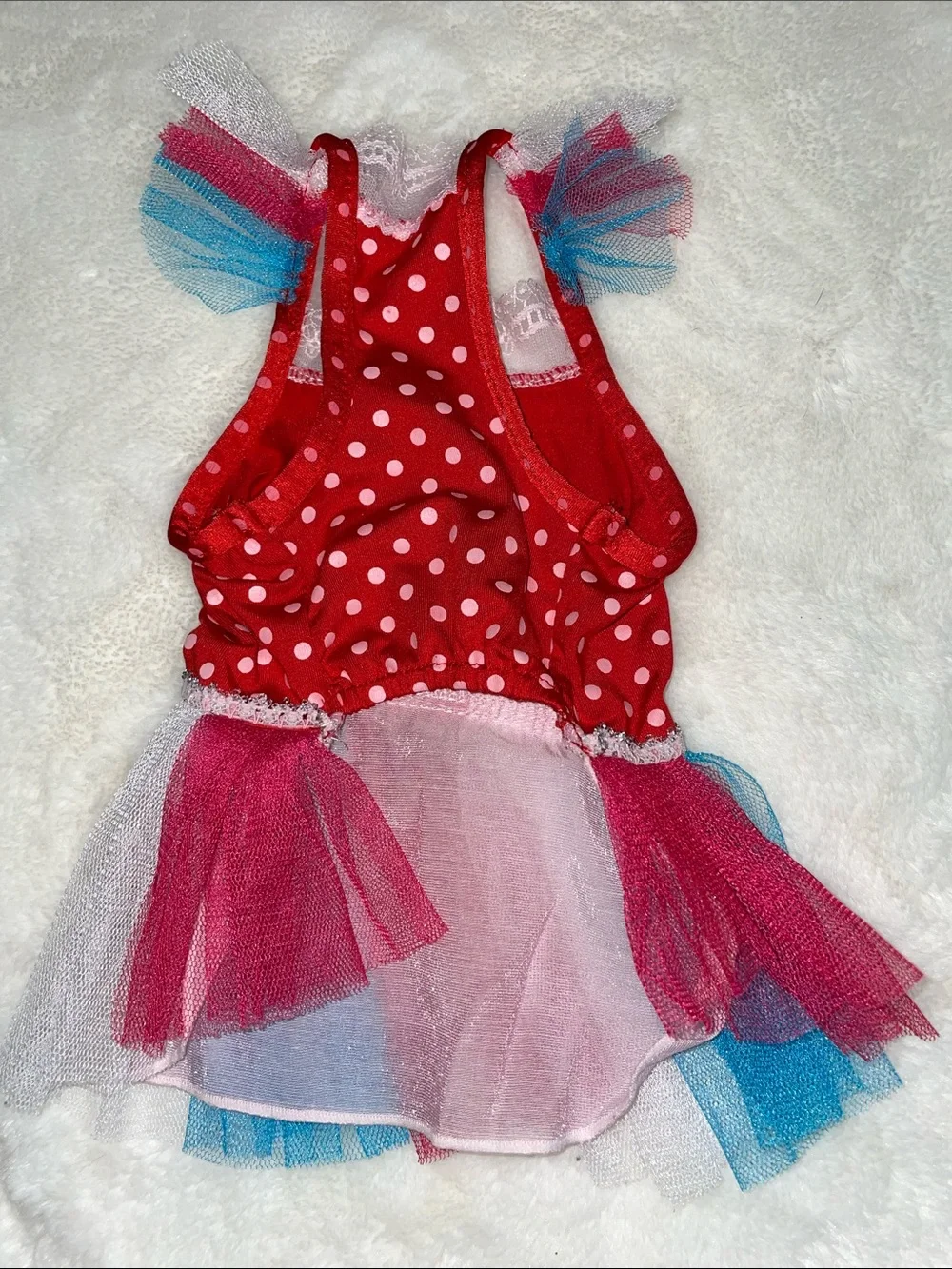 Two dog outfits, size XS…one Christmas sweater & one 4th of July dress